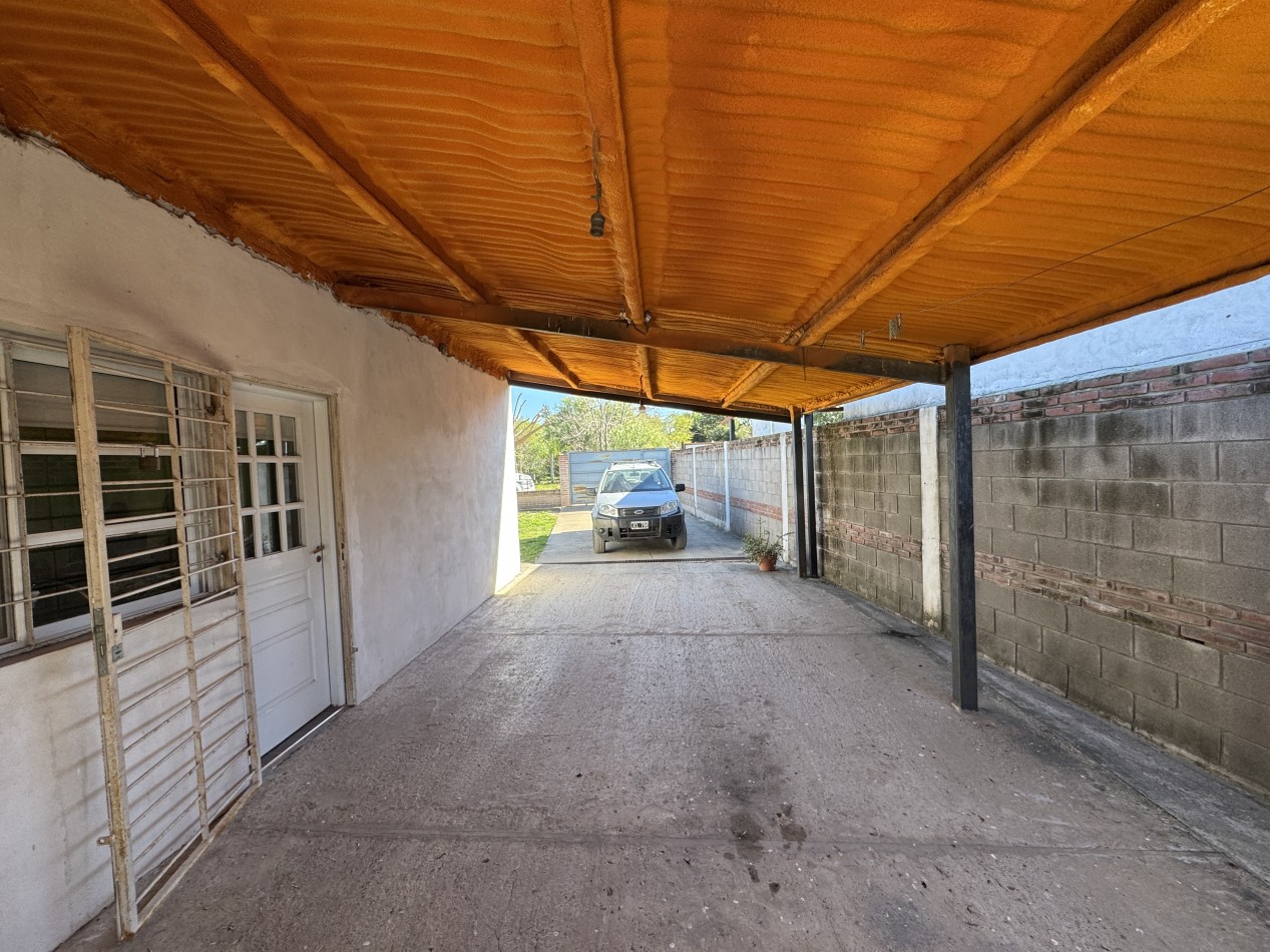 SE VENDE CASA CON AMPLIO TERRENO